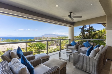 Relax on the spacious lanai, where plush seating and panoramic ocean views create the perfect spot for morning coffee or evening sunsets.