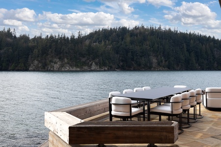 Outdoor deck with seating for ten, perfect for enjoying lakeside views.