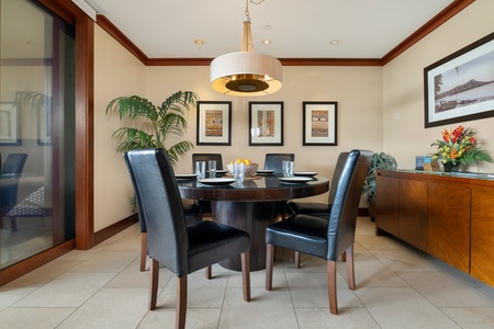 Dining space seats six and provides connection to both kitchen and living area.
