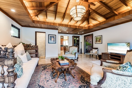 Secondary living room offers additional space for relaxing or entertaining in style.