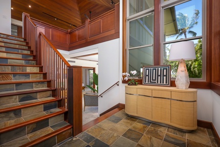 The split level home provides living, bedrooms and private lanias on each level.
