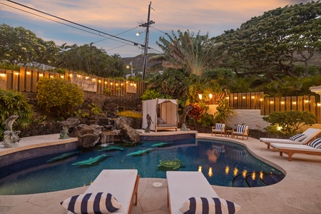 The cozy cabana by the pool is an added touch of privacy and relaxation.