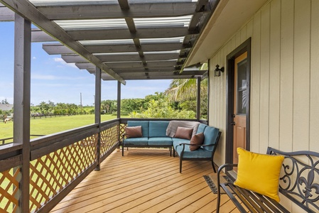 Relax on the covered deck with mountain and garden views—perfect for morning coffee or evening wine.