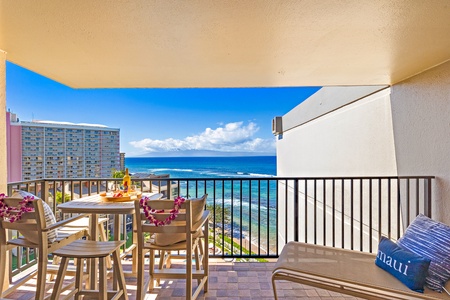 Lounge and dine comfortably in Kaanapali Shores 903’s open living space leading to the lanai.
