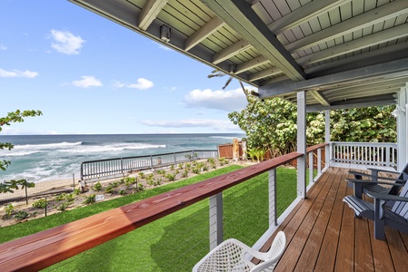 Lower-level deck with shaded seating and unobstructed views of Oahu’s legendary North Shore surf.