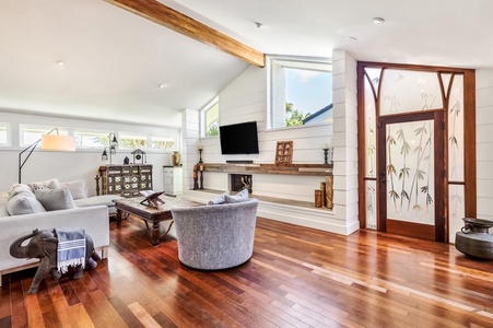 The main living area has a flat screen TV, perfect for a movie night!  