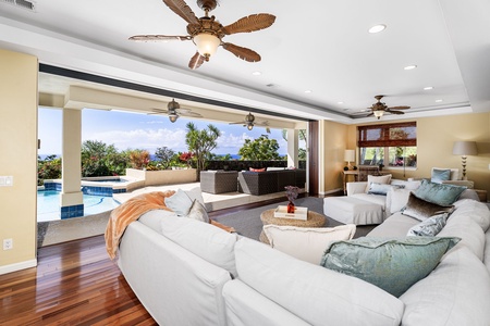 Expansive living area opening to the outdoors, offering breathtaking views and natural light.