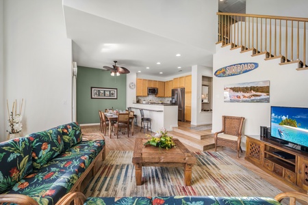 Spacious living area with vibrant island-inspired decor and natural light.