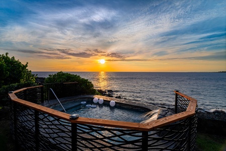 Watch the sun melt into the Pacific from your private pool-style deck.