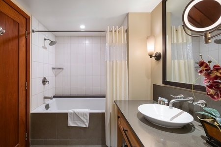 The second guest bathroom with a large soaking tub.