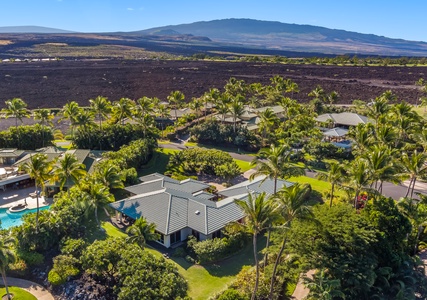 Clear skies and sunshine view emphasizing the home’s grand layout and tranquil atmosphere.