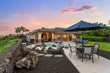 Evening poolside dining with sunset-painted skies.