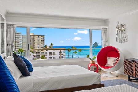 Wake up to blue skies and coastal views from the guest bedroom.