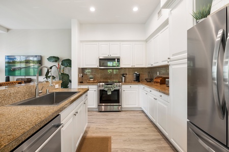 Inviting living room with warm tones and natural light, perfect for enjoying a movie night or just relaxing with a good book.