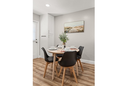 The dining area in the open concept is perfect for meals.