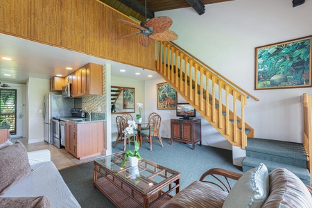 Open layout with seating, dining, and kitchen all in one welcoming space.