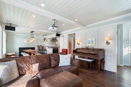 The open living and dining space gathers everyone, with the lake just outside the window.