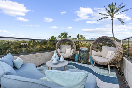 Cozy outdoor seating area with picturesque mountain views.