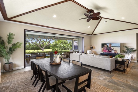 Indoor dining for six with seamless lanai access makes every meal feel like a special occasion.