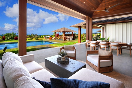 Relax in this luxurious open-air living space with breathtaking views.