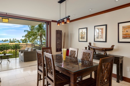 The dining room has easy access to the lanai, making it effortless to enjoy an alfresco meal in paradise.