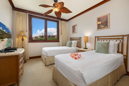 Drift off in your tropical-themed twin bedroom, where palm-leaf ceiling fans and Hawaiian touches create your island escape.