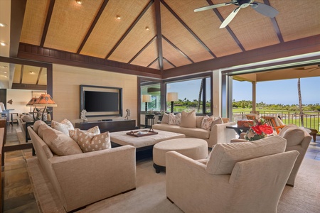 Golf course views across the fairways at Hualalai—green space and blue skies in every direction.