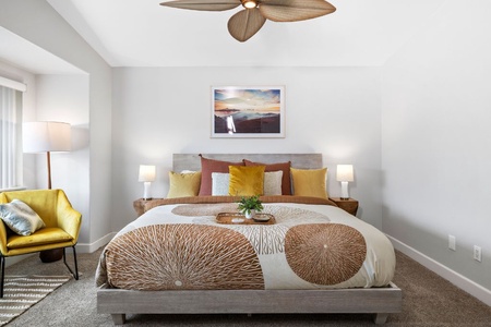 Dream easy in the serene king-bed primary suite featuring a smart TV and private ensuite.