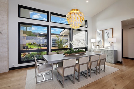 Kitchen and dining spaces behind the living area.