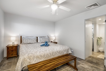 Wake refreshed and enjoy the convenience of direct access to the beautifully updated bathroom.