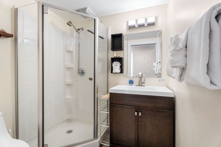 Guest bathroom conveniently located steps from the guest bedroom for ultimate ease.