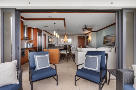 Unwind in your open-concept space where modern kitchen flows into comfortable living area, perfect for entertaining with elegant furnishings.