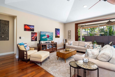 The bright and airy living area has high ceilings and central AC.