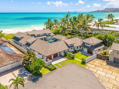 Heated pool & spa nestled amid lush tropical landscaping, steps from the sand.