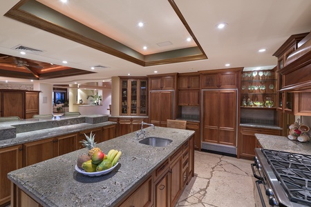 Cook like a chef in the fully equipped kitchen with premium appliances and a gas stove.