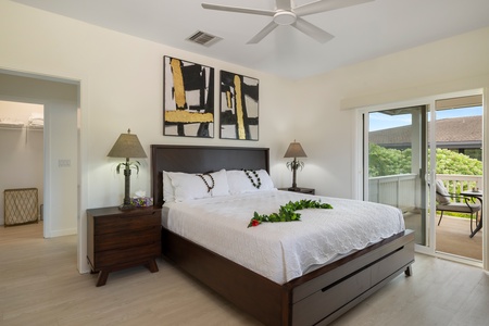 The second guest bedroom with a view and framed art.