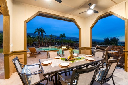 Twilight dining on the lanai with coastal views and warm breezes.