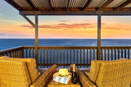 Sip cocktails and watch the horizon from the comfort of shaded outdoor seating.