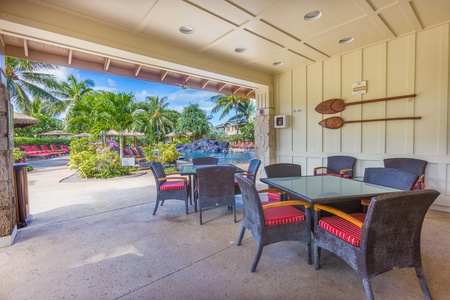 The cabana and seating area by the community pool.