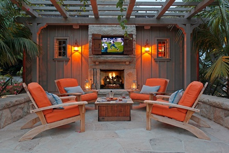 The perfect spot for a movie or sports! Outdoor fireplace and tv.