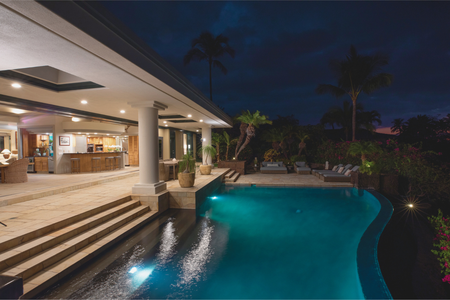 Evening tranquility by the pool — perfect for a night swim or soaking under the stars after dinner.