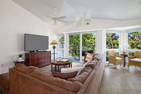 Cozy living area with a gorgeous garden view, ideal for relaxation.