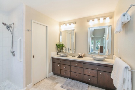 Dual vanities provide space and convenience for a pampered stay.