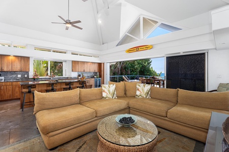 Spacious great room with vaulted ceilings and open-air living just steps from the sea.