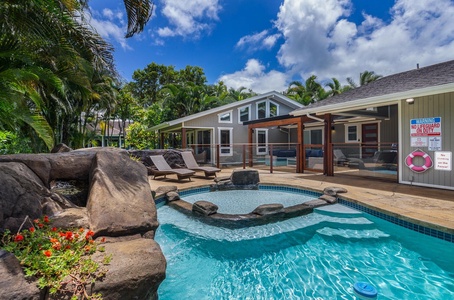 At Pohaku Villa, relax by your own gated saltwater pool with ample loungers and serene garden surroundings.