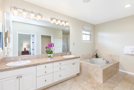 Primary bathroom with double vanity sinks