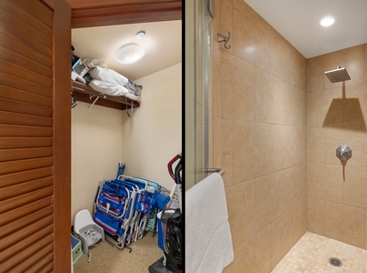 Your spacious walk-in shower features modern rainfall head and glass doors, with convenient storage closet nearby for all your gear.