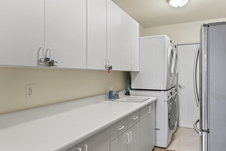 Convenient laundry room with modern appliances to keep things fresh during your stay.