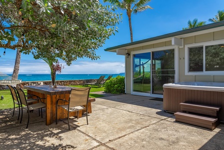 Outside, you'll find a picnic table perfect for outdoor dining and ocean views