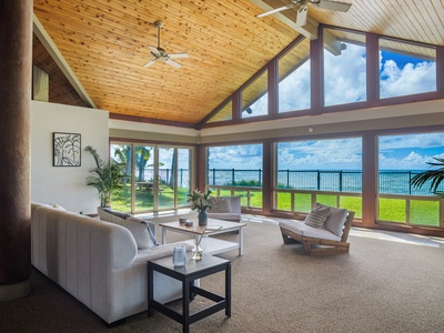 Large windows frame the mesmerizing ocean views.